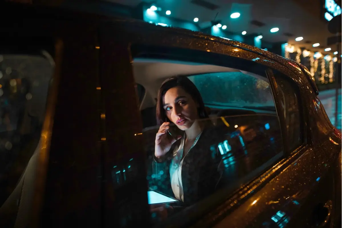 Passenger travelling by taxi for a planned airport journey