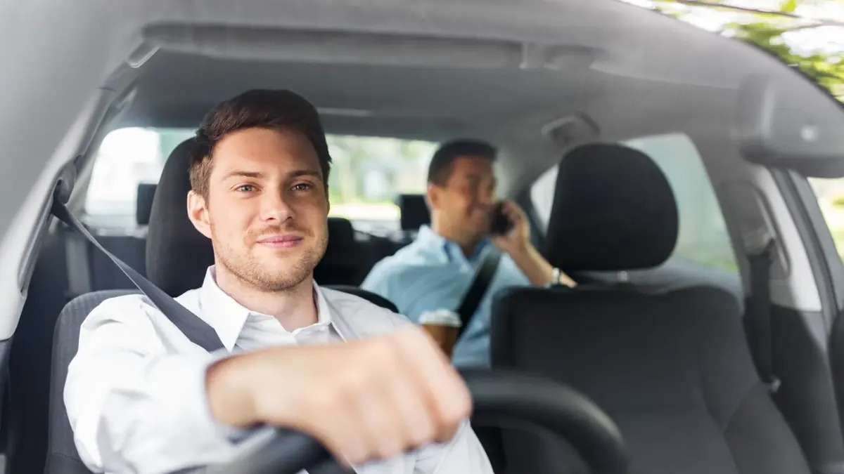 Professional taxi driver and passenger